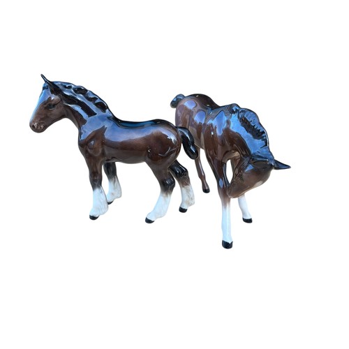 197 - A BESWICK GLAZED HORSE AND 1 OTHER