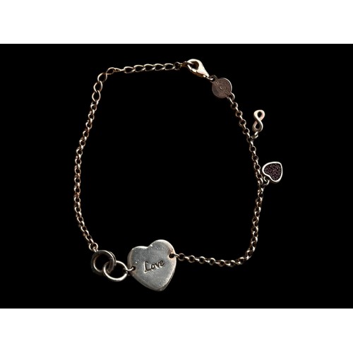 233 - A SILVER HEART AND CHARM NOMINATION SILVER BRACELET