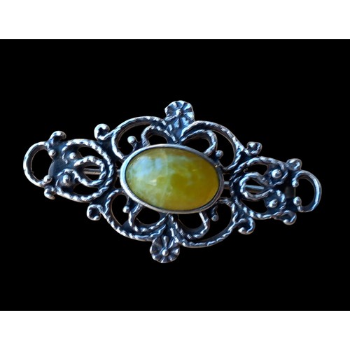 249 - A SILVER & NATURAL STONE BROOCH