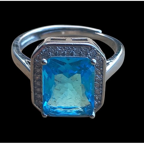 266 - A LARGE SILVER GEM SET BLUE STONE RING