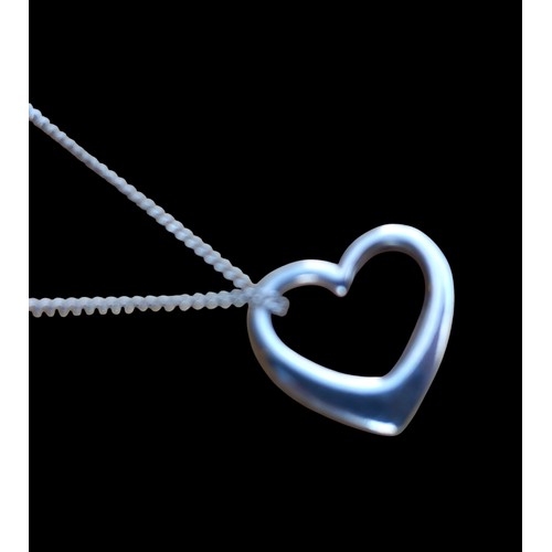 268 - A SILVER HEART PENDANT ON A SILVER CHAIN