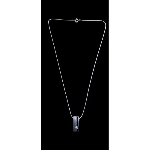 274 - A SILVER SOLITAIRE PENDANT ON A SILVER CHAIN