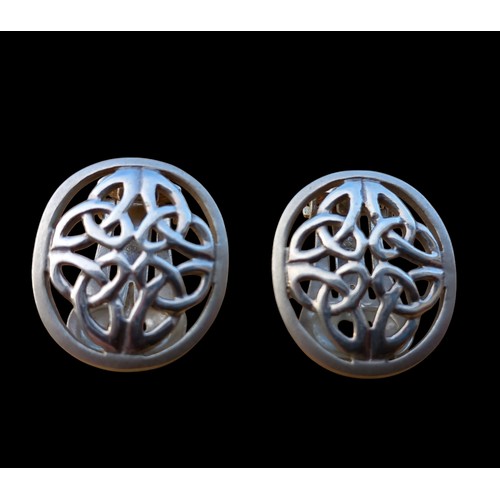 275 - A LARGE PAIR OF SILVER CLIP ON CELTIC DESIGN EARRINGS