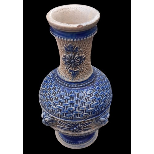 285 - A POTTERY VASE IN STYLE OF DOULTON OF LAMBETH