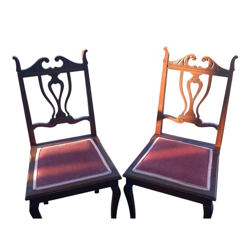 301 - A PAIR OF CARVED BACK MAHOGANY BEDROOM CHAIRS