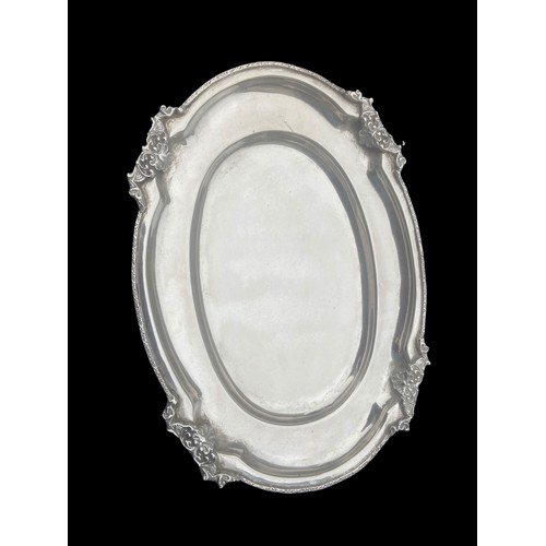 305 - A SILVER OVAL SHAPED SALVER THE TOP IS SET TO 4 SECTIONS WITH SHELL AND FLORAL PATTERN A FINE DECORA... 