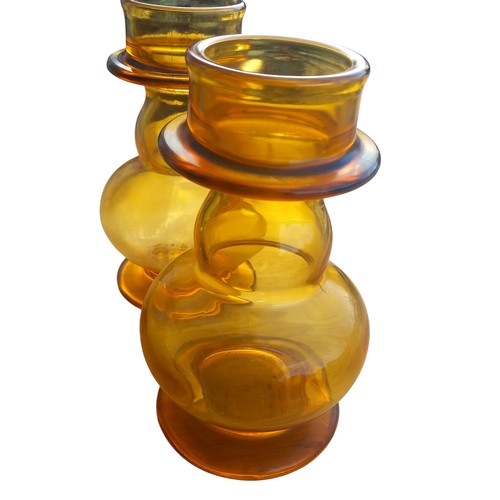 358 - 4 AMBER GLASS SHAPED JARS