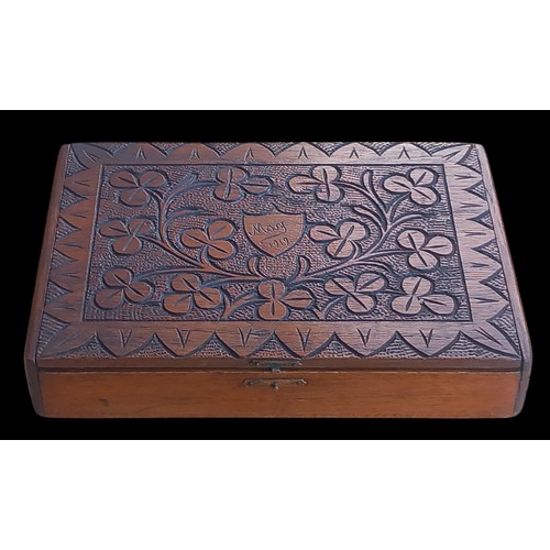 374 - A CARVED WOODEN SHAMROCK BOX