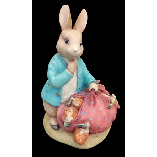 388 - A BOXED BORDER FINE ARTS PETER RABBIT WITH ONJIONS MONEY BOX (WITH CERTIFICATE)