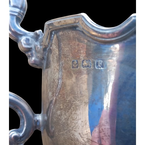 583 - A BIRMINGHAM SILVER 2 HANDLED CUP DATED 1930 WEIGHS 105 GRAMS