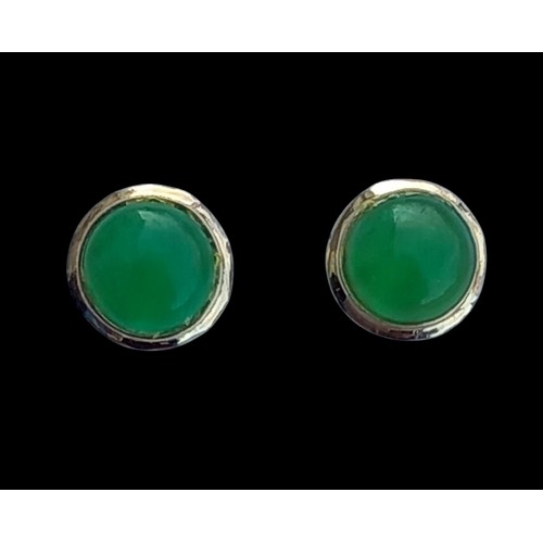 606 - A PAIR OF ROUND JADE EARRINGS WITH GOLD SURROUND 8MM DIA STEM FITTING MADE IN 14K GOLD 1.06G