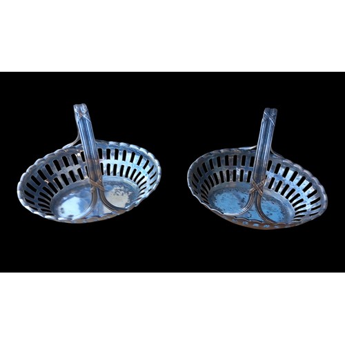 607 - A PAIR OF SMALL PIERCED SILVER BASKETS