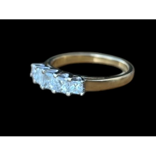 647 - A YELLOW GOLD RING SET WITH 5 PRINCESS CUT DIAMONDS APPROX 1.25CT TOTAL IN WHITE MOUNTD