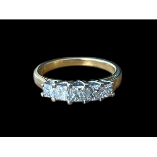 647 - A YELLOW GOLD RING SET WITH 5 PRINCESS CUT DIAMONDS APPROX 1.25CT TOTAL IN WHITE MOUNTD