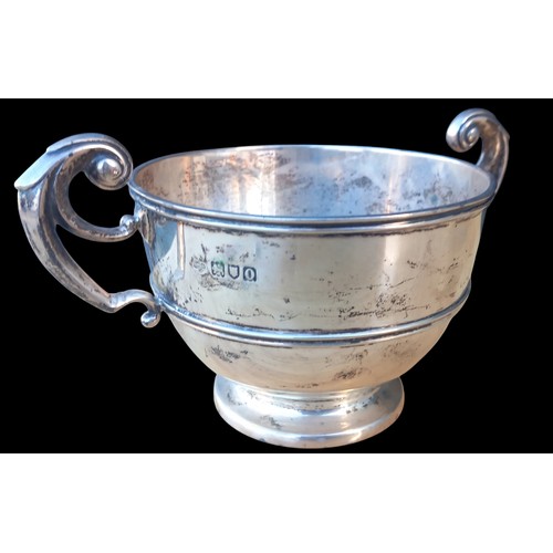 657 - A LONDON SILVER DOUBLE HANDLED CUP WEIGHS 210G