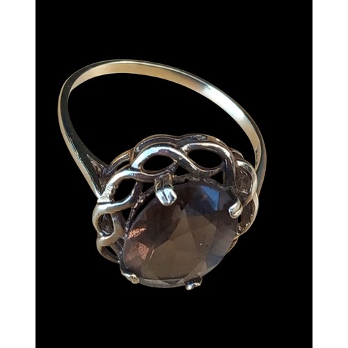 663 - AN 9CT SMOKEY QUARTZ RING