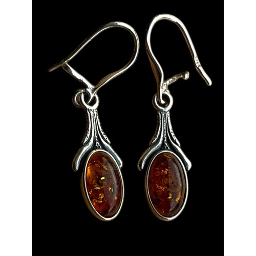 490 - A PAIR OF ORNATE  SILVER AMBER SET EARRINGS