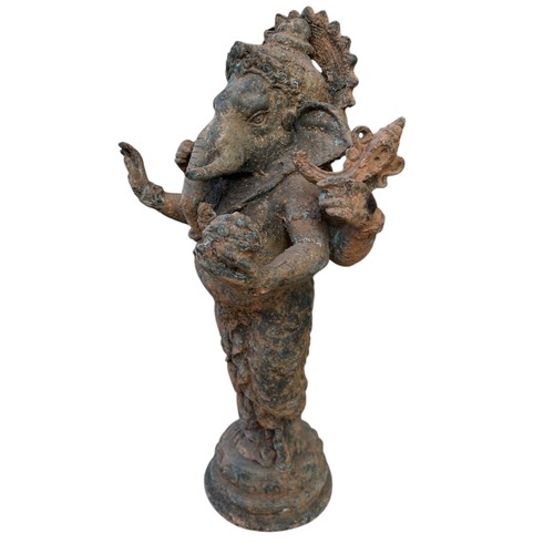 710 - AN ANTIQUE GANESHA STATUE....POSSIBLY BRONZE