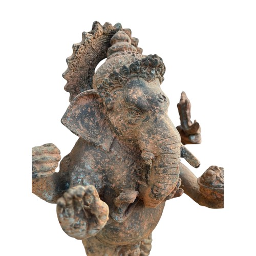 710 - AN ANTIQUE GANESHA STATUE....POSSIBLY BRONZE