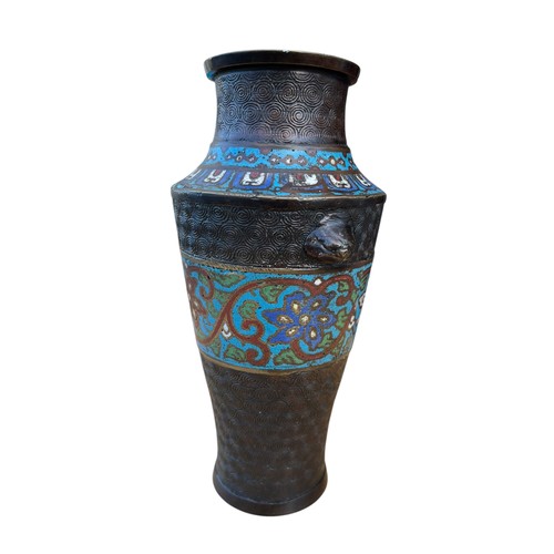 713 - A BRONZE AND ENAMEL VASE