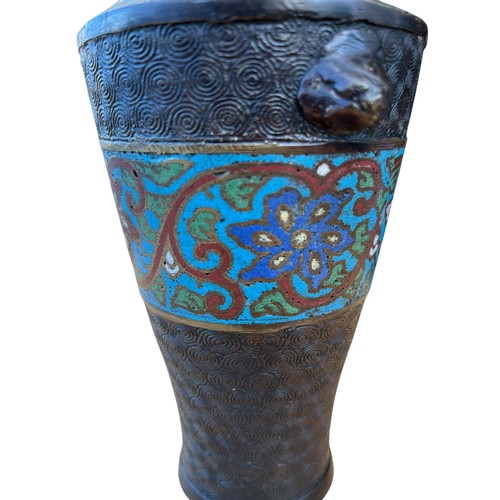 713 - A BRONZE AND ENAMEL VASE