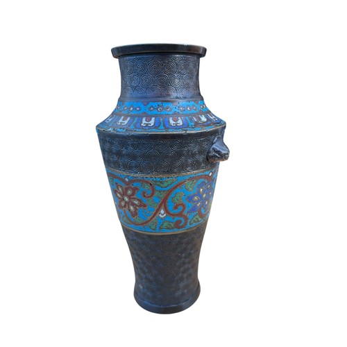 713 - A BRONZE AND ENAMEL VASE