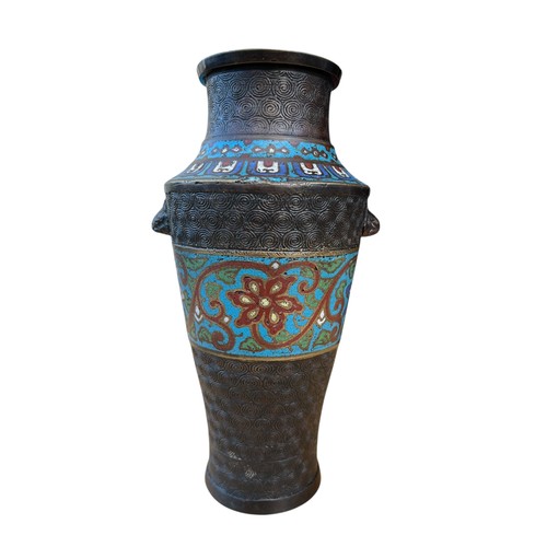 713 - A BRONZE AND ENAMEL VASE