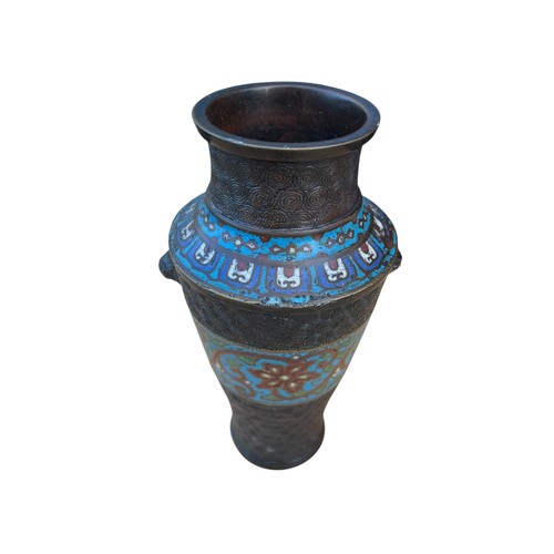 713 - A BRONZE AND ENAMEL VASE