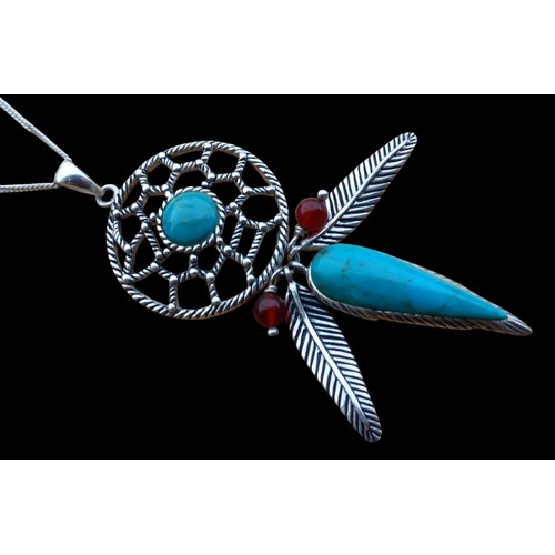 495 - A STUNNING SILVER DREAM CATCHER PENDANT SET WITH TURQUOISE STONES ON A SILVER CHAIN