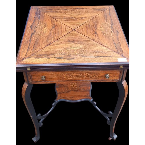 719 - A SUPERB ANTIQUE ROSEWOOD HEAVILY INLAID ENVELOPE TABLE