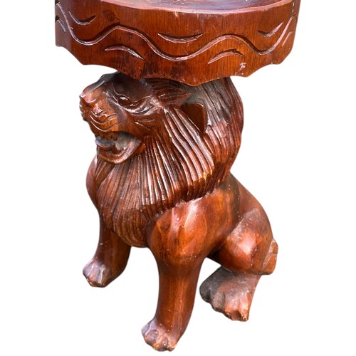 728 - A  MAHOGANY STOOL WITH CARVED LION BASE