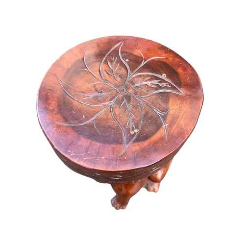 728 - A  MAHOGANY STOOL WITH CARVED LION BASE