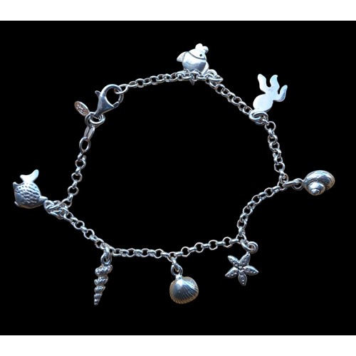 550 - A SILVER SEASIDE THEMED CHARM BRACELET COMPLETE CHARMS