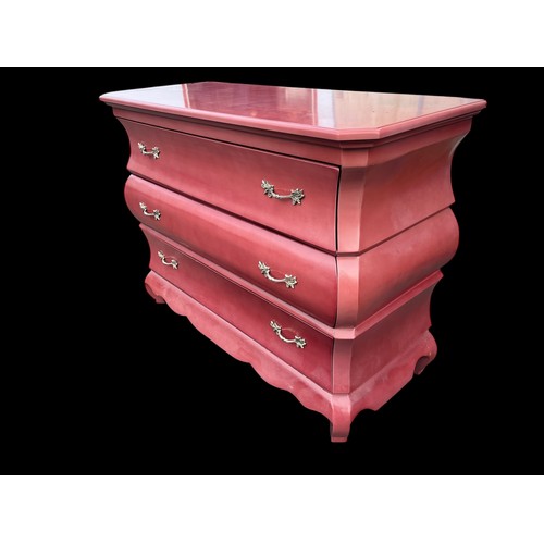 423 - A BURGANDY SHAPED 3 DRAWERED CHEST