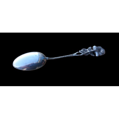 565 - A SILVER TEASPOON WITH ROSE TO HANDLE