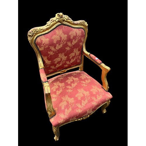 693 - A GILT FRAMED ARMCHAIR