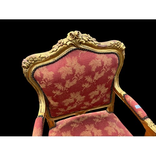 693 - A GILT FRAMED ARMCHAIR