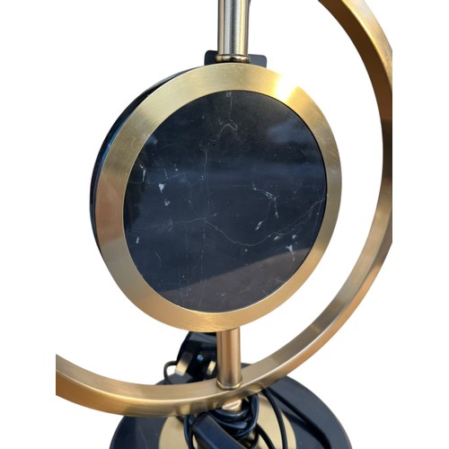 698 - A NEW GILT AND BLACK ONYX TABLE LAMP