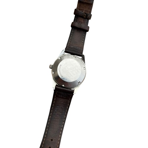 614A - AN OMEGA GENEVA WATCH WITH ORIGINAL LEATHER STRAP