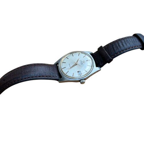 614A - AN OMEGA GENEVA WATCH WITH ORIGINAL LEATHER STRAP