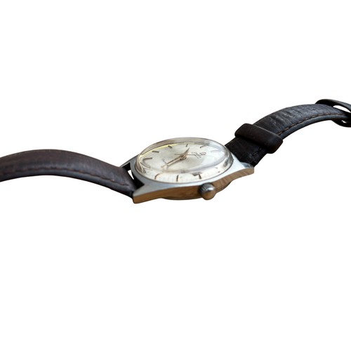 614A - AN OMEGA GENEVA WATCH WITH ORIGINAL LEATHER STRAP