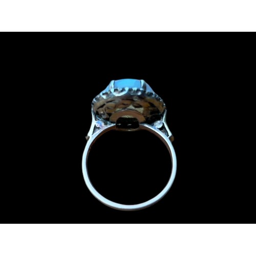 622A - A 9CT GOLD (TESTED) RING SET WITH LARGE OPAL STYLE STONE