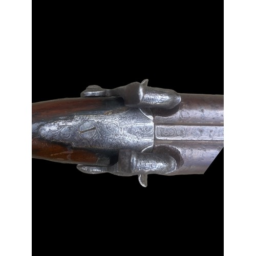 730A - AN EARLY 19CT PERCUSSION DOUBLE BARRELL SHOTGUN BY MANTON OF LONDON