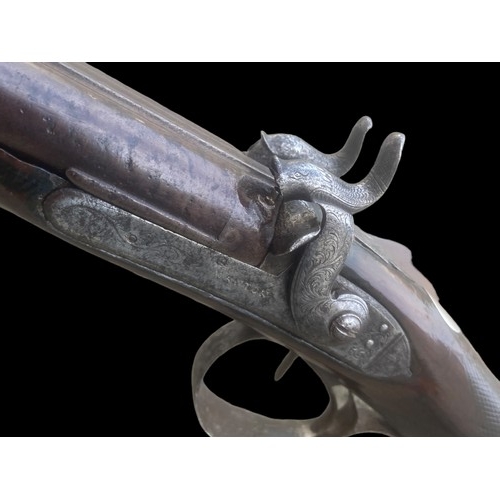 730A - AN EARLY 19CT PERCUSSION DOUBLE BARRELL SHOTGUN BY MANTON OF LONDON