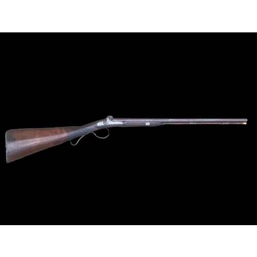 730A - AN EARLY 19CT PERCUSSION DOUBLE BARRELL SHOTGUN BY MANTON OF LONDON