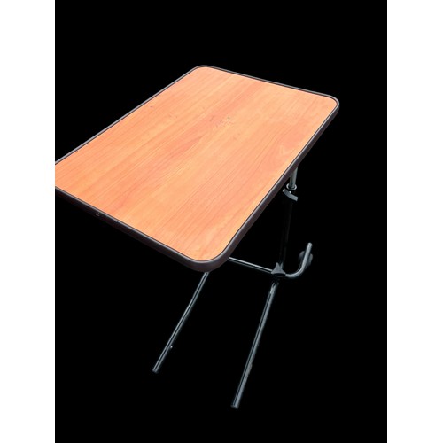 24 - AN ADJUSTABLE T.V TABLE