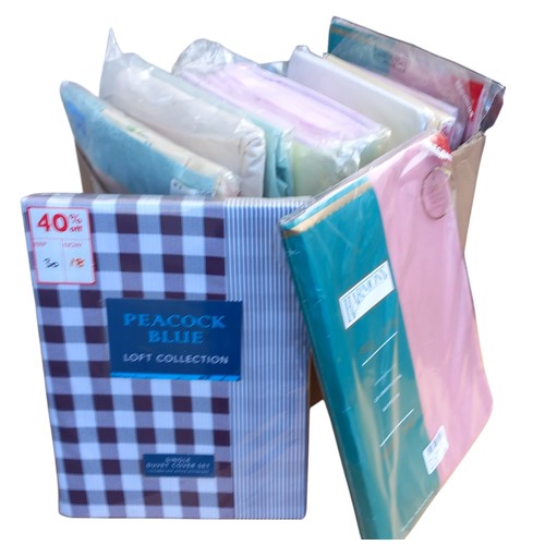 31 - BOX OF NEW BED LINENS