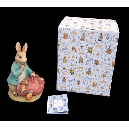 92 - A BOXED BORDER FINE ARTS PETER RABBIT WITH ONJIONS MONEY BOX (WITH CERTIFICATE)