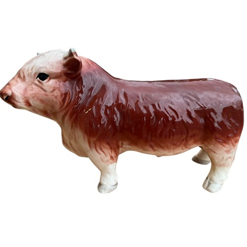 155 - A CERAMIC BUTCHERS BULL 19X31cm