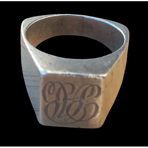 183 - A CHUNKY SILVER SHAPED SIGNET RING